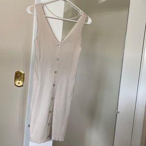 Beige thin sweater dress with mother of pearl buttons